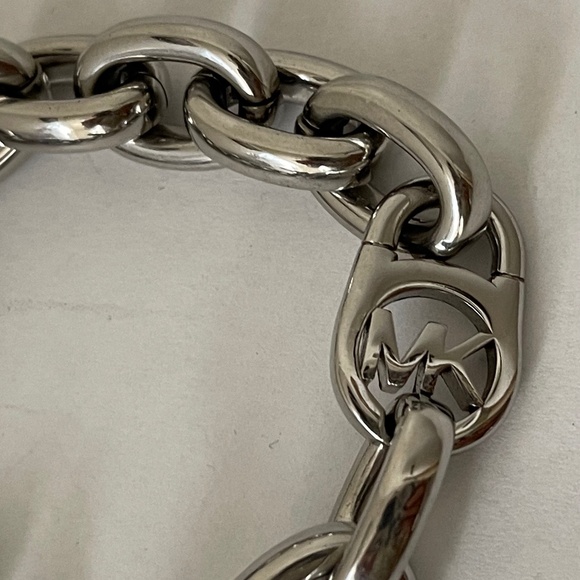 Michael Kors Polished Silver Tone MK Logo-Lock Bracelet. - Picture 3 of 6